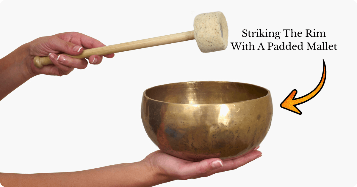 striking the the rim with padded mallet